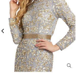 Mac Duggal beaded platinum and gold open back evening gown.